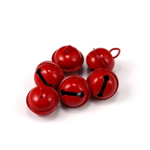 Close-up of six glossy red metal bells with top hanging loops and T-shaped sound slots