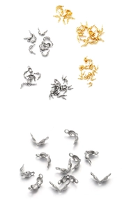 Detailed macro view of gold and silver stainless steel fold-over cord end caps for jewelry