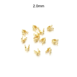 Macro detail of 2.0mm gold stainless steel pinch bails for DIY jewelry making