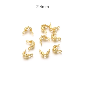 Macro detail of 2.4mm gold-plated stainless steel ball chain connectors for DIY jewelry making