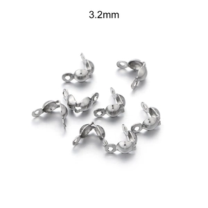 Macro view of 3.2mm stainless steel bead tips for DIY jewelry making and necklace finishing