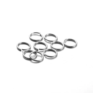 Polished silver metal jump rings in a close-up for jewelry making and connecting