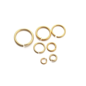 Macro shot of gold plated jump rings in various sizes for DIY jewelry making
