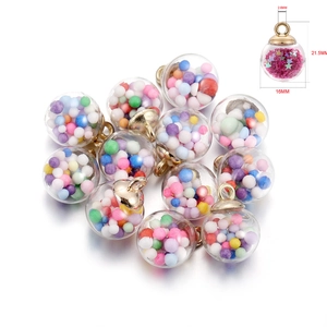 Detail showing 16mm glass ball pendants with colorful sequins and gold loop for DIY jewelry