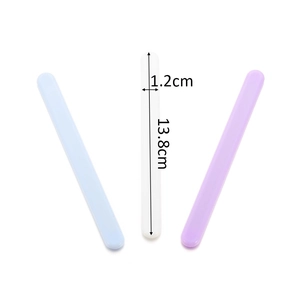 Detail view of 13.8cm resin mixing sticks in blue, white and purple for DIY craft projects