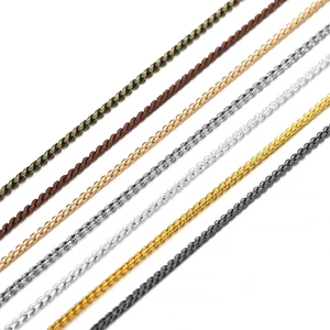 DIY fine jewelry making chain assortment with multi-color twist links on white background