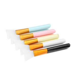 Detailed view of 5-piece silicone face mask brushes with soft fan heads and colorful handles