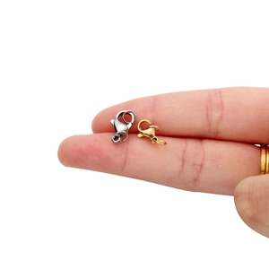 Size comparison of gold and silver stainless steel lobster clasps for DIY jewelry making