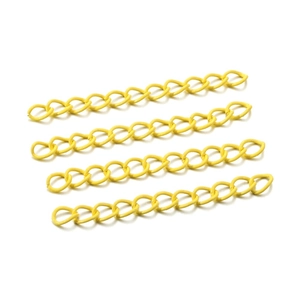 Macro detail of 50mm bright yellow painted metal extender chains for DIY jewelry making