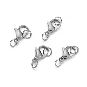 Close-up of four polished stainless steel lobster clasps for DIY jewelry making