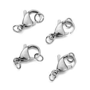 Close-up of four polished stainless steel lobster clasps with jump rings for jewelry making