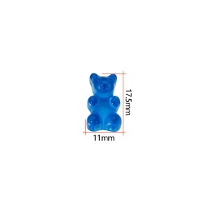 Detailed view of royal blue translucent resin bear charm measuring 17.5mm by 11mm
