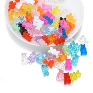 Macro shot of colorful transparent resin bear beads for DIY jewelry making accessories