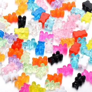 Mix of colorful resin bear pendants for DIY jewelry making in various vibrant shades