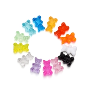 Circle arrangement of colorful resin gummy bear charms for DIY jewelry making and crafts