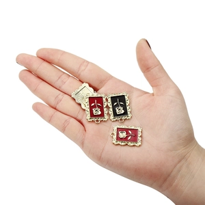Retro alloy rose flower pendants in red and black enamel with vintage gold frames