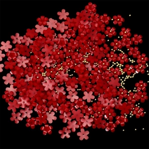 Detail shot of red resin flower beads and gold metal steel balls for DIY nail art design
