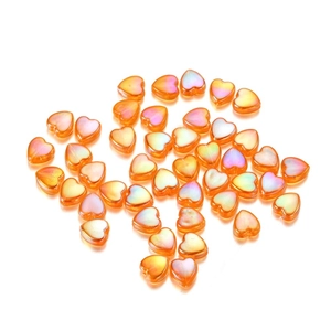 Mixed candy colors 9mm acrylic heart beads with iridescent finish on white background