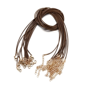 Detail of 45cm brown waxed cord necklaces with gold lobster clasps and extension chains