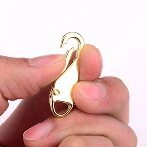 Golden alloy spring buckle for DIY bags and backpacks with a detachable metal zipper puller