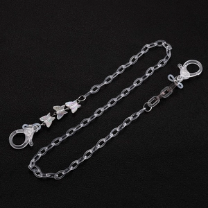 Macro shot of acrylic eyeglass chain with lobster clasps and gradient butterfly charms