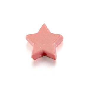 Macro shot of candy pink acrylic star bead with central hole for DIY jewelry making