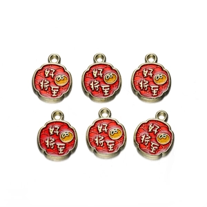 Detail of six alloy enamel charms with Good Fortune Chinese characters and orange elements