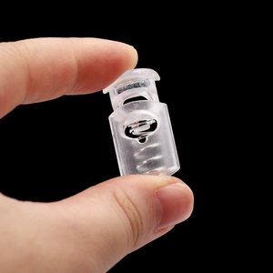 Transparent plastic cord lock with spring mechanism for backpacks and DIY accessories