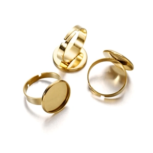 Three gold adjustable ring bases with round trays for jewelry making and DIY crafts