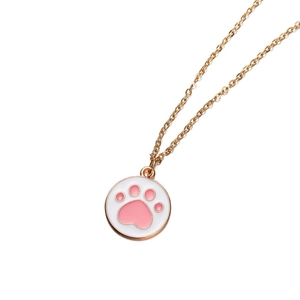 Golden chain necklace with white enamel round pendant featuring a cute pink cat paw design