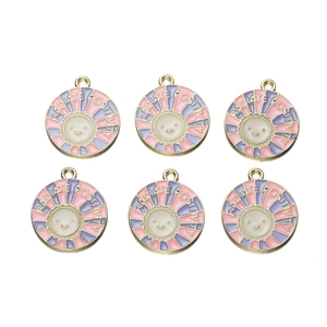 Detail of round enamel sun charms with 'Radiate Positivity' text for DIY jewelry