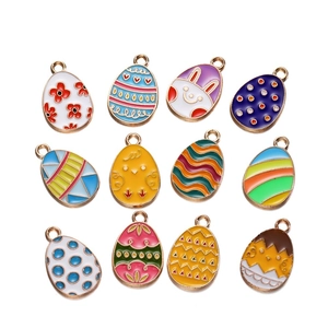 Detail of 12 colorful Easter egg charms with enamel patterns for DIY jewelry making