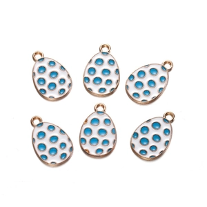 Detailed view of six egg-shaped alloy charms with blue dots and gold frames for DIY jewelry