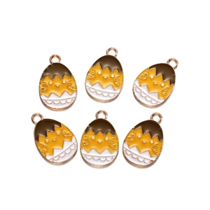 Close-up of 6 Easter chick enamel alloy charms for DIY jewelry making accessories