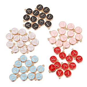 Macro detail of alloy initial A charms with colorful enamel finish for DIY jewelry making