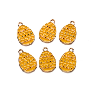 Set of 6 yellow enamel Easter egg charms with geometric patterns and gold metal loop