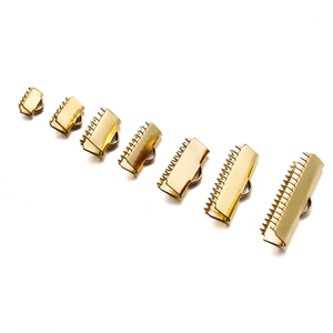 Set of seven gold stainless steel ribbon crimp ends in various widths with loop detail