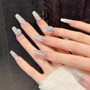 Extra long coffin press-on nails with silver glitter gradient and 3D rhinestones