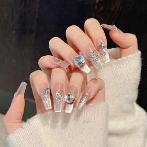 Elegant cat eye press-on nails with silver glitter and luxury 3D rhinestones