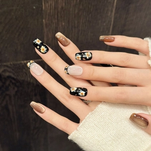 Handmade press-on nails in vintage gold floral design with cat-eye and pearl finishes