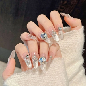 Handmade silver cat-eye press-on nails with luxury rhinestones and pearl accents