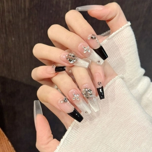 Long trapezoid cat eye press-on nails with butterfly charms and silver glitter gradients