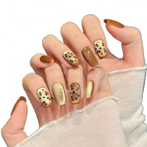 Caramel brown leopard print cat eye press-on nails in medium square oval shape