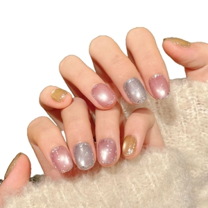 Pink and silver cat eye press-on nails with sparkling glitter and French tips