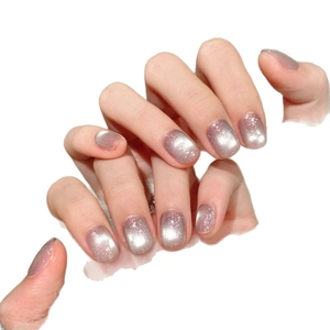 Sparkly silver-grey cat-eye press-on nails with shimmering fine glitter and short round shape
