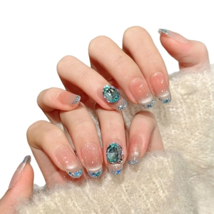Pink gradient blue press-on nails with luxury rhinestones and cat-eye glitter effect