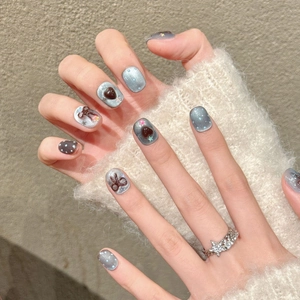 Blue-brown bow press-on nails with grey cat-eye finish and 3D heart star charms