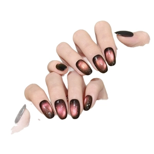 Unghie finte fatte a mano sfumate rosso-marrone effetto cat eye con glitter