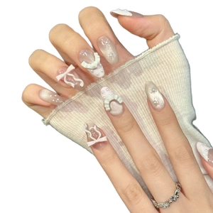Pink gradient bow pearl press-on nails with cat-eye effect and 3D textured details