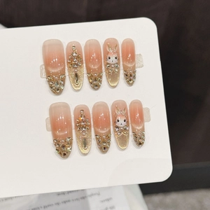 Pink gradient handmade press-on nails with rabbit charms and rhinestones